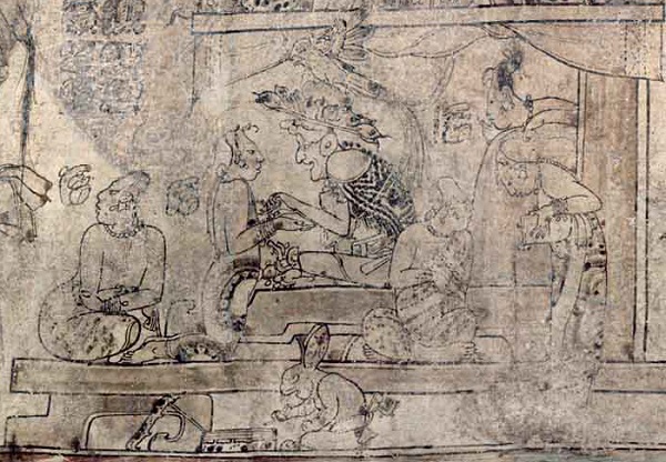 Decoration shows a figure on a throne, the Maya god L, surrounded by his attendants.