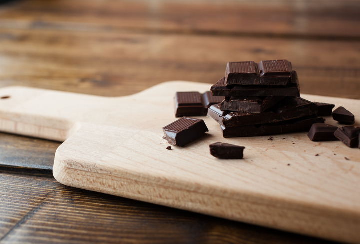 Organic dark chocolate that's soy-free on a cutting board.