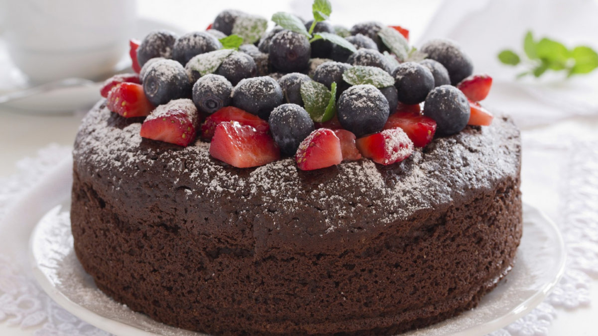 Chocolate cake with berries on top