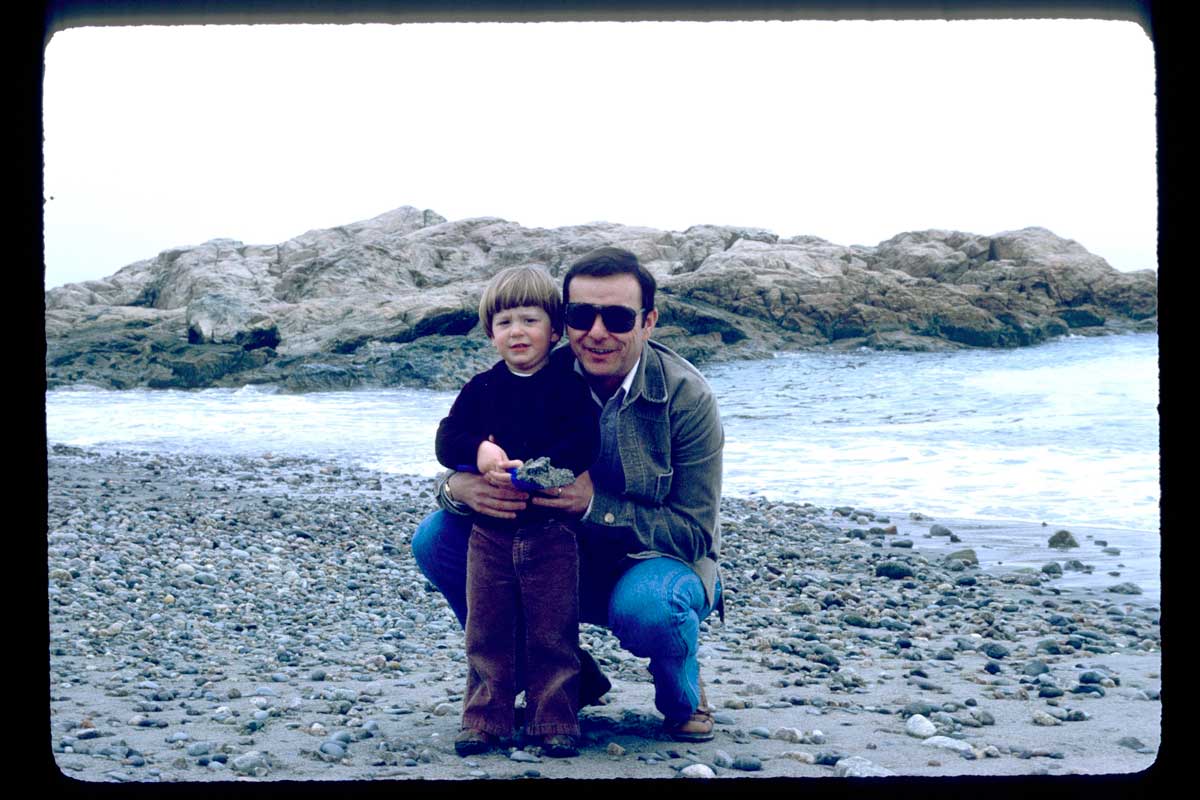 Father's Day picture of a boy and his dad on the beach together