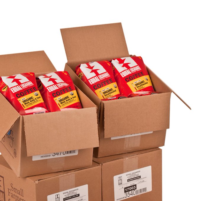 Stacked boxes of Equal Exchange coffee bags